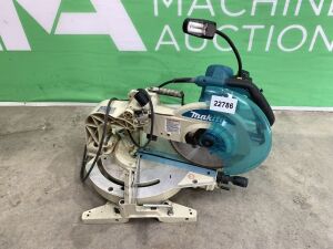 UNRESERVED Makita Chopsaw c/w Blade