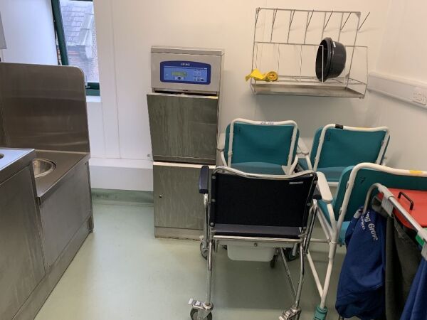 Cleaning Room-S/S Sink/Press/Waste Disposal, 1 x Metal Storage Press, S/S WHS, S/S Getinge Front - Loader Flusher-Disinfector, 4 x Commodes, Linen Trolly