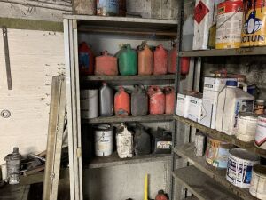 Shelving Unit c/w Contents to Include Large Selection of Fuel Cans - Many Full of Petrol
