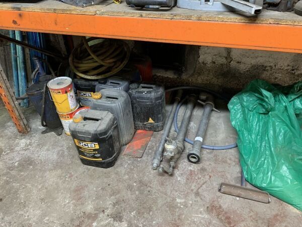 Contents Under Shelf to Include: Oil Drums, Hoses, Hydrant Keys, Hoses & More