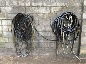 Lot to Include: Large Selection of Various Hydraulic Hosing, Poker Hoses, Straps & More